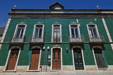 Green tiled facade-Neoclassical house-cobbled R.Joao Vaz Corte Real Street. Tavira-Portugal-093
