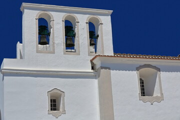 Fototapeta na wymiar Triple bell gable-pristine blue sky-Our Lady of Carmel Church. Tavira-Portugal-098