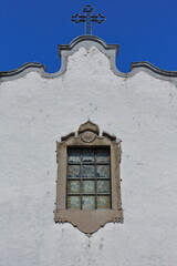 Window on facade-Rococo pediments-Hermitage of Saint Blaise-Sao Bras. Tavira-Portugal-104