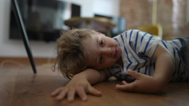 Child yawning waking up from nap drowsiness after sleep