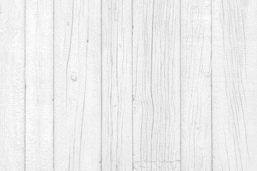 Fototapeta na wymiar Wooden background. Old black and white painted fence in good condition. Solid wooden wall from weathered cracked boards. Barn wood wall.