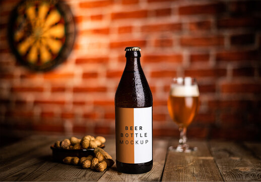 Fresh Lifestyle Beer Bottle on Wooden Table in a Restaurant with a Glass of Beer in Dim Atmosphere Background