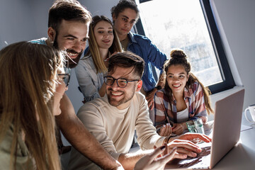 Software developing workers at a meeting  in conference room. They discuss future projects.	
