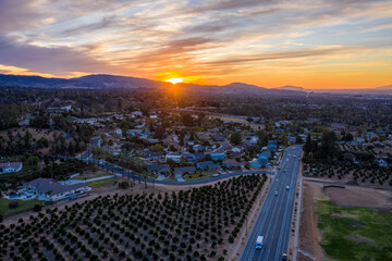 Aerial view of city at sunset