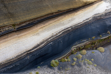 Close-up view of different layers of volcanic ashes at La Tarta, Teide National Park, Tenerife,...