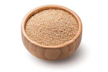 Quinoa seeds in wooden bowl isolated on white background. Organic superfood