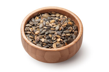 Pumpkin seeds in wooden bowl isolated on white background. Organic superfood