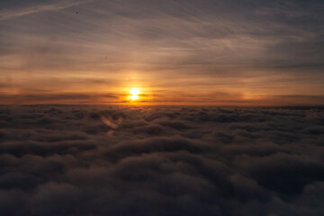 Sunrise over the clouds