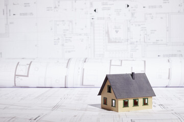 House building project concept with plans