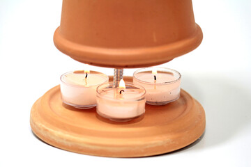 Tealight oven for the greenhouse - obrazy, fototapety, plakaty