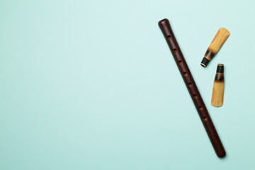 Armenian national musical instrument duduk on color background. Top view