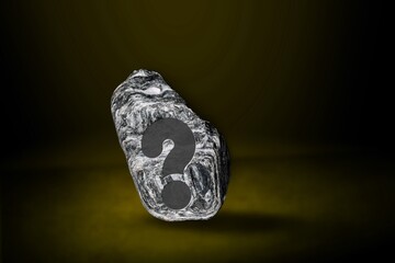 Naklejka premium Question mark concept. Motivational Inspirational Background. Stone
