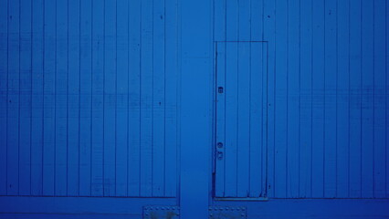 large blue wood factory door