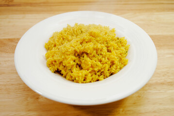 Side Dish of Steaming Herb and Yellow Rice