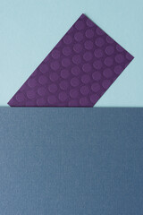 purple paper on blue