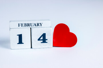  White block calendar and Red heart on white background with copy space