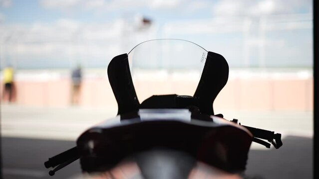 Motorcycle windshield in the paddock