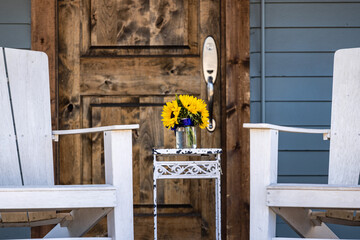 Flowers and table on the front porch
