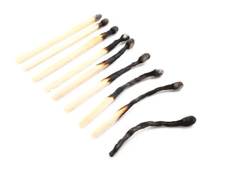 Row of matches on white background. Concept of different human life phases