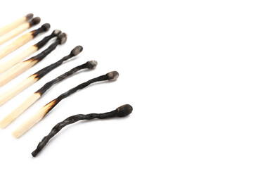 Row of matches on white background, closeup. Concept of different human life phases