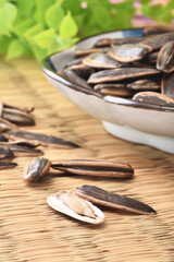 Sunflower seeds on table, closeup view  