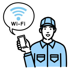 スマホを持ってWi-Fiの説明をしている作業服の若い男性
