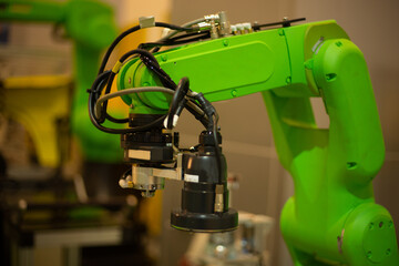Robotic arm for check and test process automation with AI machine learning