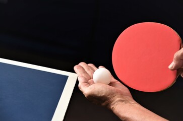 table tennis ball in player hand