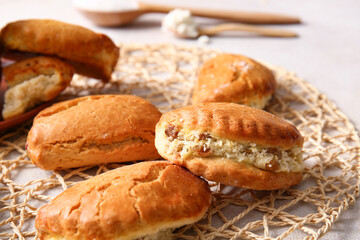 Tasty sochniki with cottage cheese on light background, closeup