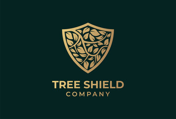 Tree shield logo. gold branch tree inside shield. vector illustration