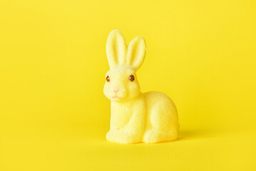 Cute Easter bunny on yellow background