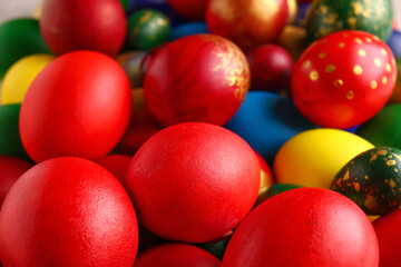 Different Easter eggs as background, closeup