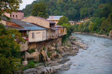 Fototapeta na wymiar houses in georgia on the slope of the river in kutaisi