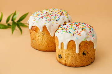 Delicious Easter cakes on beige background