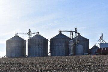 Grain Bins in a Farm Field