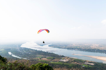 Paragliding with a trainer over the Mekong River Thailand Paragliding Extreme Sports