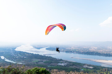Paragliding with a trainer over the Mekong River Thailand Paragliding Extreme Sports