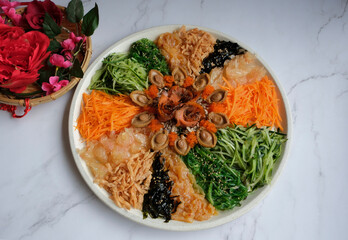 Chinese New Year must have dish. Seafood Yusheng aka Prosperity Toss with Abalone. Homemade Cantonese style 
