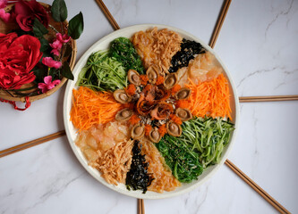 Chinese New Year must have dish. Seafood Yusheng aka Prosperity Toss with Abalone. Homemade...