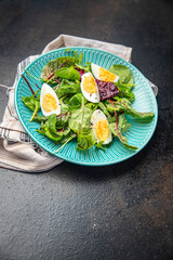 easter salad egg green leaves mix fresh portion dietary healthy meal food snack on the table copy space food background rustic top view keto or paleo diet veggie vegetarian food no meat