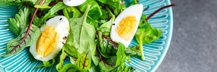 easter salad egg green leaves mix fresh portion dietary healthy meal food snack on the table copy space food background rustic top view keto or paleo diet veggie vegetarian food no meat