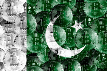 Holds a physical version of Bitcoin and the Pakistani flag. Concept map of Pakistani cryptocurrency...