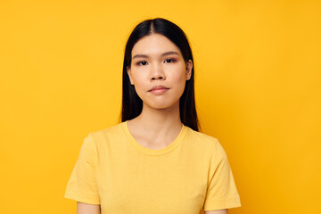 pretty asian woman in yellow t-shirt monochrome photo