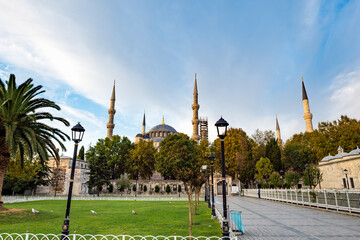 Blue Mosque, Sultan Ahmet Mosque, at dawn. The view of architecture, garden and facade in old town, Istanbul, Turkey	