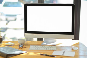 Modern office desk with pc desktop computer white screen monitor