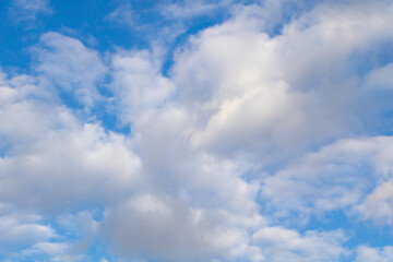 Close up shot of a blue sky with white clouds