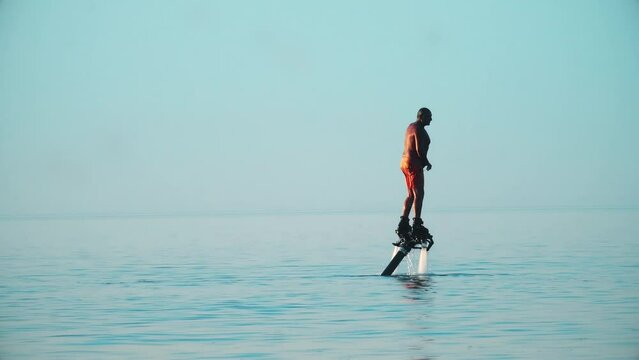 Fly boarding with jet ski extreme water sports