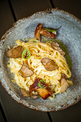 pasta with black truffle closeup