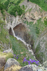 Kyzyl-su Waterfall surrounded by the Caucasus Mountains near Elbrus, Jily-su, Russia