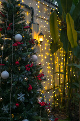 Decorated Christmas tree with christmas toys and garland. Happy new year. High quality photo.